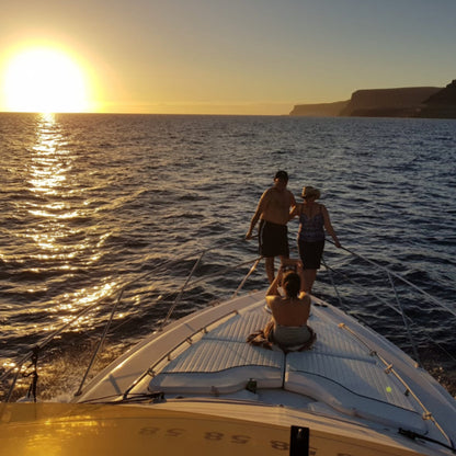 dolphin watching gran canaria - shared yacht - keeper one - blue m - sunset on the deck