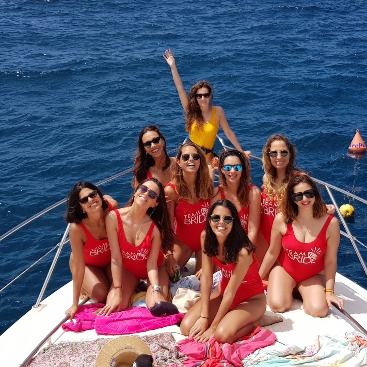 dolphin watching gran canaria - shared yacht - keeper one - blue m - girls enjoying the trip