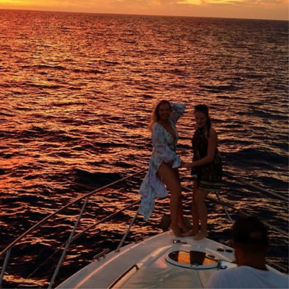 dolphin watching gran canaria - shared yacht - keeper one - blue m - enjoying the sunset